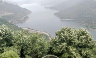 Relaxing moment with Turkish tea and a breathtaking view of a lake and mountains from Maşukiye, Kocaeli.